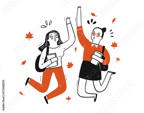 Two students are doing hi5