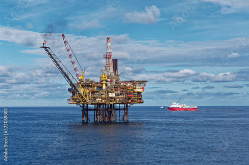 The Gannet A installation being passed by the Eagle Explorer Gun Boat during Close Pass Undershoot Operations in the North Sea.