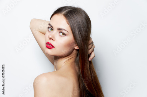 Charming woman naked furnace red lips long hair skin care 