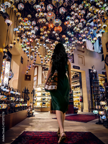 Photography a woman in a traditional Ally in Dubai
