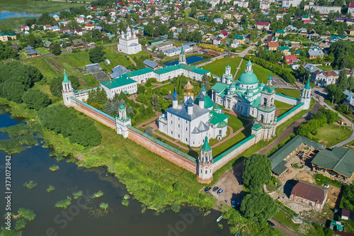 Scenic aerial view of old Spasso-Yakovlevsky Monastery in Rostov Veliky in Yaroslavl Oblast in Russian Federation. Beautiful summer sunny look of orthodox temples in center of ancient fortress