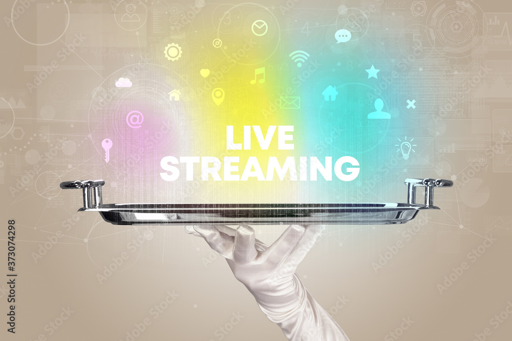 Waiter serving social networking with LIVE STREAMING inscription, new media concept Waiter serving social networking with LIVE STREAMING inscription, new media concept