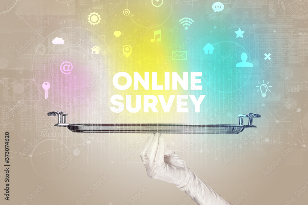Waiter serving social networking with ONLINE SURVEY inscription, new media concept Waiter serving social networking with ONLINE SURVEY inscription, new media concept