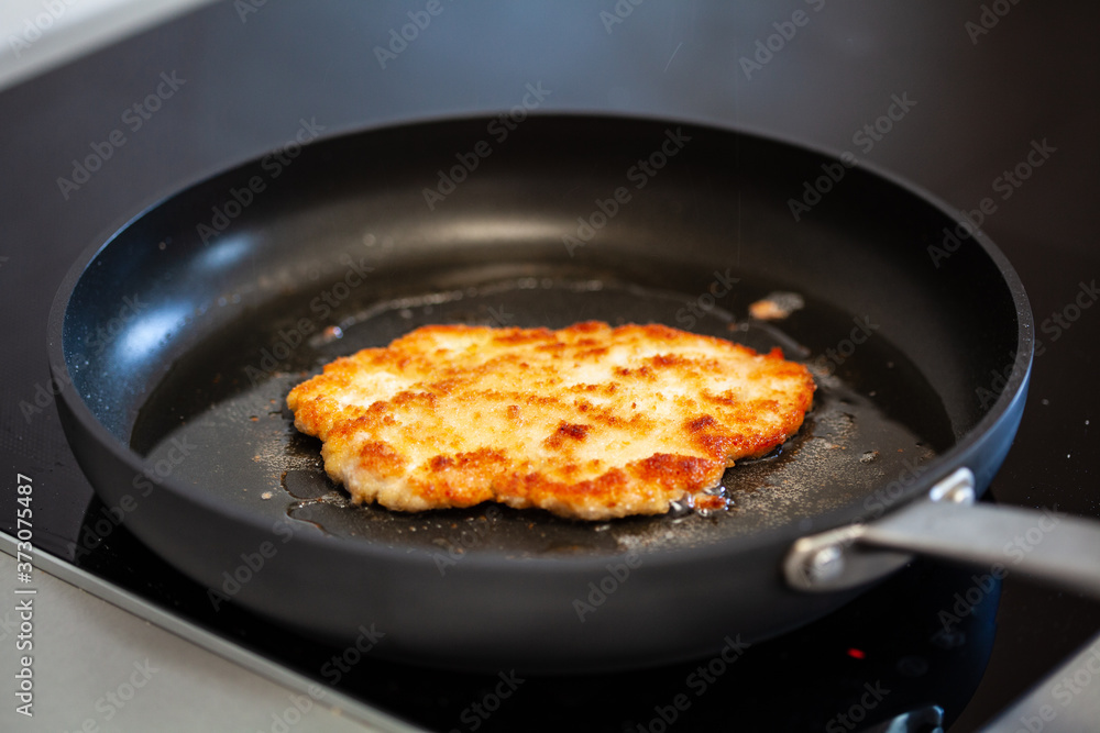 Pork chop in frying pan
Pork chop in frying pan