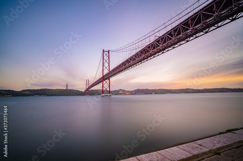 LISBOA, PORTUGAL - Aug 01, 2020: 25 de Abril Bridge at S photo