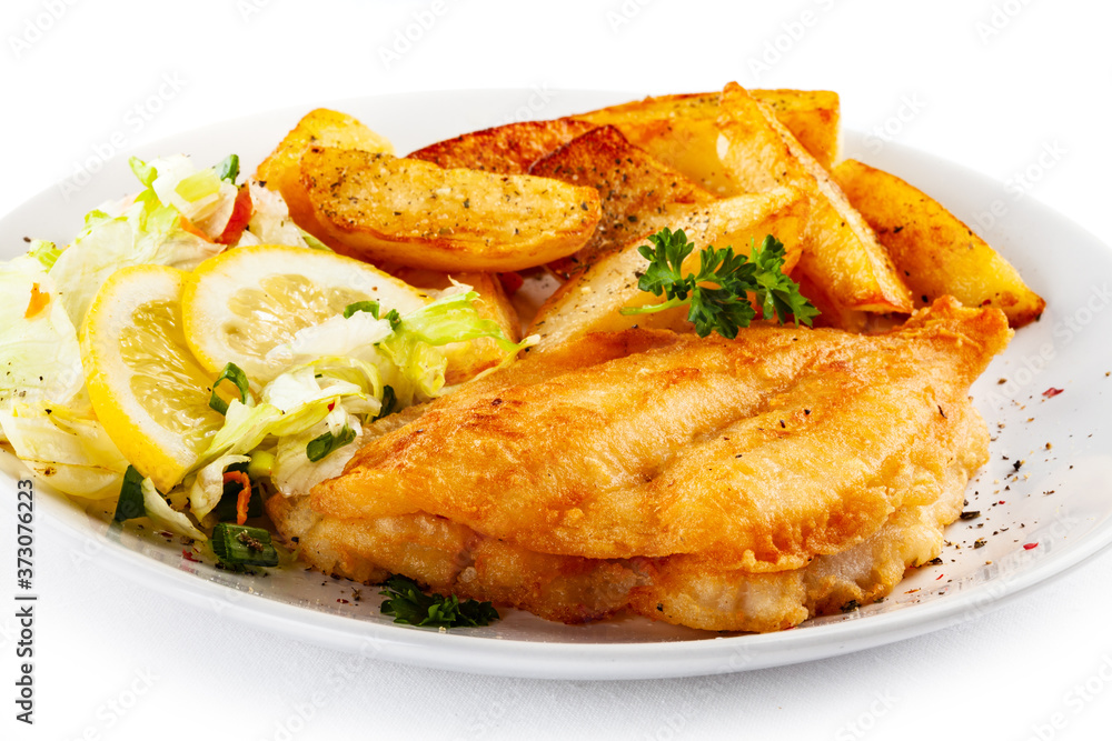 Fried fish with potatoes on white background
Fried fish with potatoes on white background