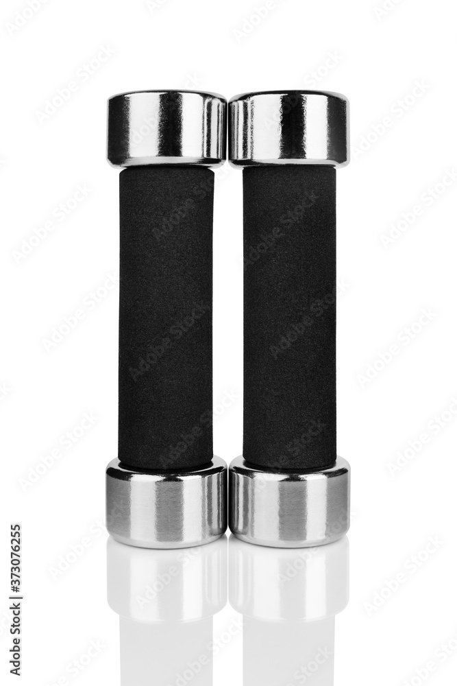 Two dumbbells on white background isolated close up with reflection, metal barbells set, pair of iron fitness bar-bells, sport equipment, bodybuilding concept, healthy lifestyle, gym training, nobody Two dumbbells on white background isolated close up with reflection, metal barbells set, pair of iron fitness bar-bells, sport equipment, bodybuilding concept, healthy lifestyle, gym training, nobody