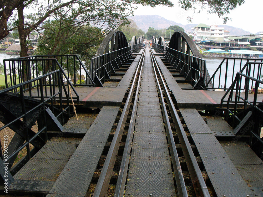 Kanchanaburi, Thailand, January 26, 2013: Train tracks over the Bridge on the River Kwai. World War II in Kanchanaburi, Thailand.