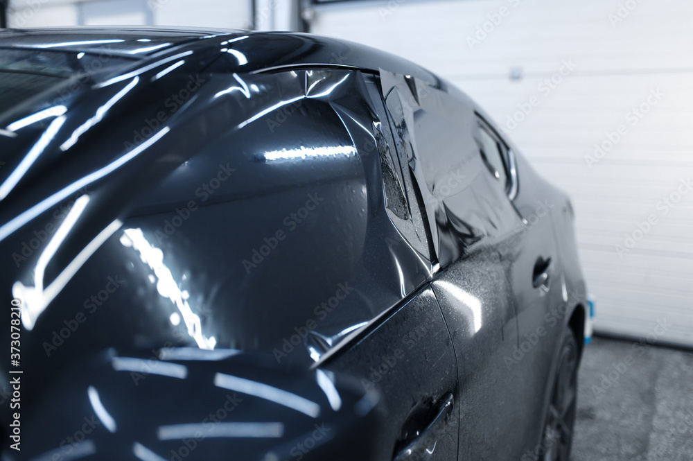 Fototapeta premium Tinting on side car windows, vehicle tuning