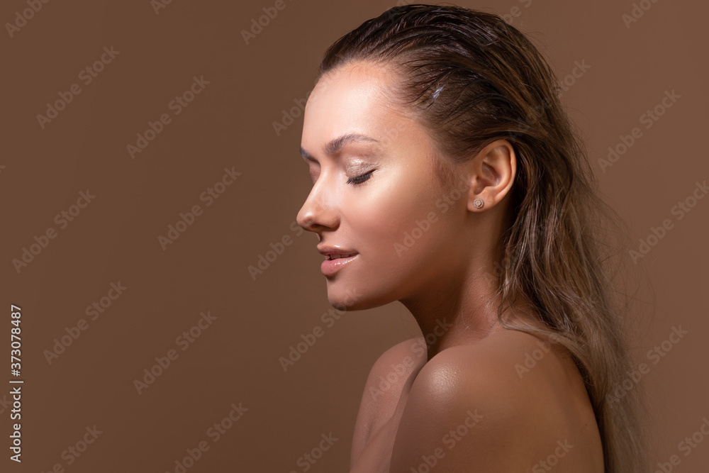 tanned, sweet girl with clear, glowing skin. Health and skin care. tanned, sweet girl with clear, glowing skin. Health and skin care.