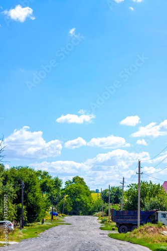 A road in a rural area. Landscape with beautiful sky and road.
