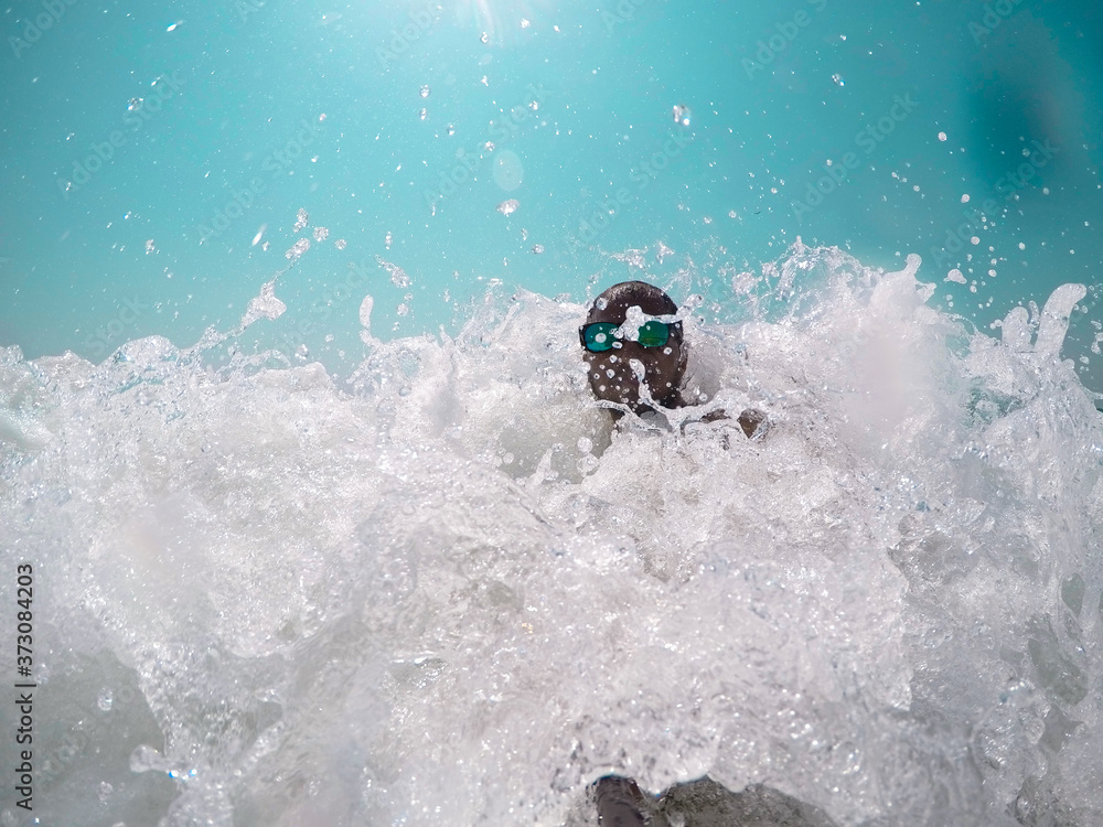 Naklejka premium A person playing water sports in sea