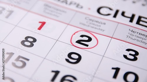 Make a red cirkle with marker on the date, numbers 2 in the calendar