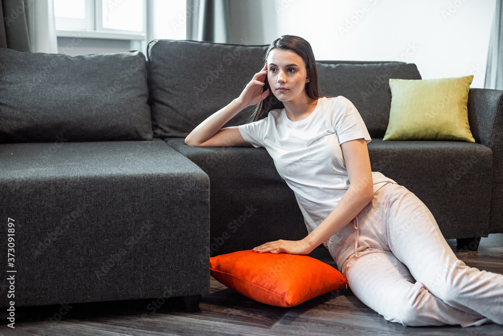 Obraz premium Young woman pretty relaxing on couch in living room