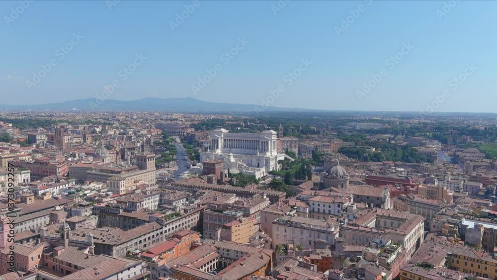 Aerial view of Rome, Altare della Patria (Altar of the Fatherland), ancient city center excavation site and Colosseum in background - cityscape panorama of capital city of Italy from above, Europe Aerial view of Rome, Altare della Patria (Altar of the Fatherland), ancient city center excavation site and Colosseum in background - cityscape panorama of capital city of Italy from above, Europe