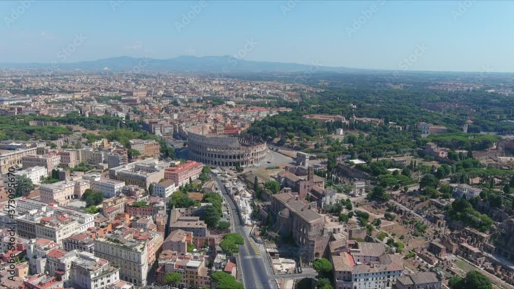 Aerial view of Colosseum in Rome, famous ancient amphitheater and ruins of ancient city center in foreground - landscape panorama of Italy from above, Europe
Aerial view of Colosseum in Rome, famous ancient amphitheater and ruins of ancient city center in foreground - landscape panorama of Italy from above, Europe