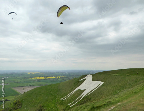 Paragliding above Westbury White Horse in Wiltshire	 photo