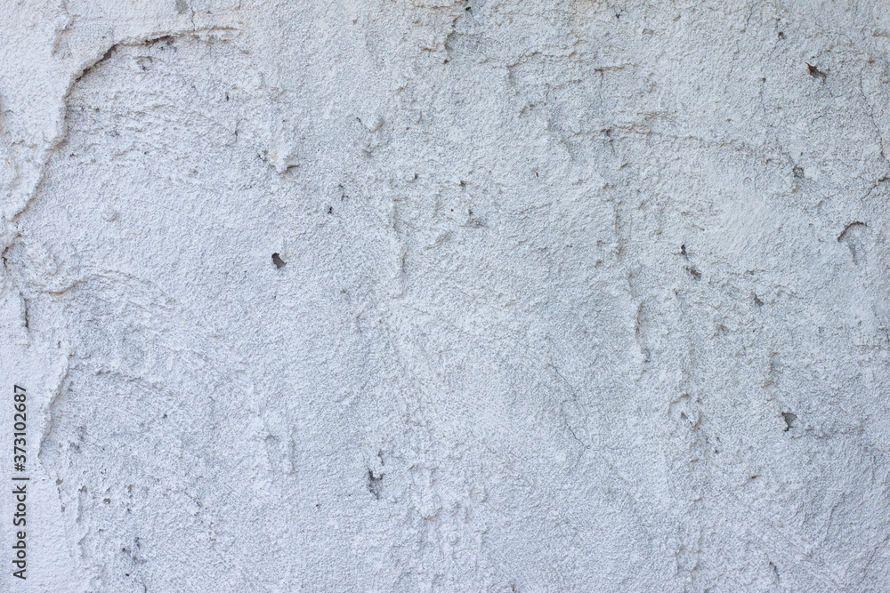 Textured of plastered cement wall is uneven is design and concept for background. Textured of plastered cement wall is uneven is design and concept for background.