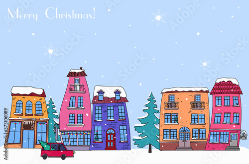 Wallpaper Mural Winter city landscape on Christmas eve. Snow day, street with bright decorative houses. For postcards, prints, and other design elements. Torontodigital.ca