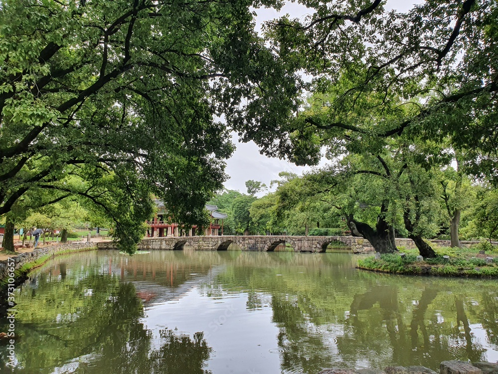 Namwon-si, Jeollabuk-do, South Korea - 24th July 2020 : Bridge and Scenery of Gwanghallu Garden or Gwanghallu Pavilion on a rainy day Namwon-si, Jeollabuk-do, South Korea - 24th July 2020 : Bridge and Scenery of Gwanghallu Garden or Gwanghallu Pavilion on a rainy day