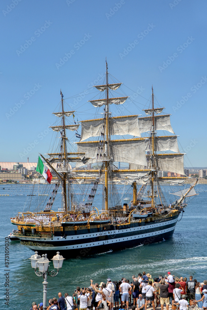 The Amerigo Vespucci training ship of the Italian Navy crosses the navigable canal of Taranto, Puglia, Italy The Amerigo Vespucci training ship of the Italian Navy crosses the navigable canal of Taranto, Puglia, Italy