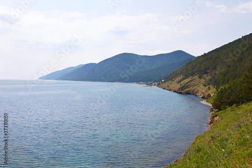 Beautiful landscape of lake Baikal, Russia. Sunny summer evening