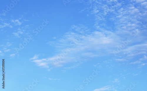 Beautiful Blue Sky with Fluffy White Clouds