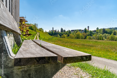 Ausblick von einer Holzbank auf Beuerberg photo