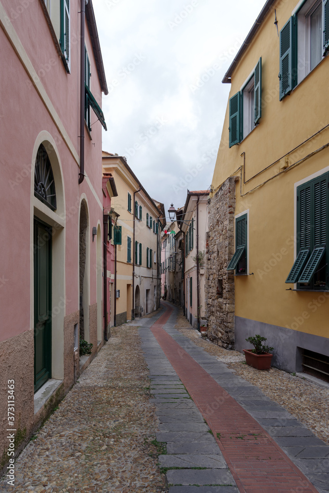 Typical Italian narrow street, Diano Castello ancient village, Province of Imperia, Italy