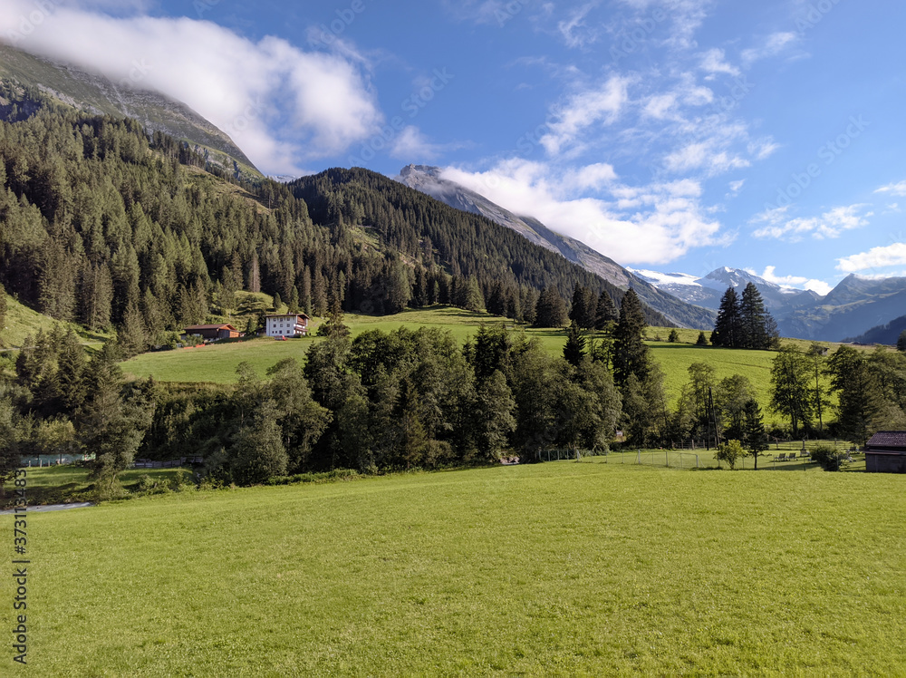 View to Tuxertal valley with Tux river and Zillertal alps near village Juns and Hintertux glacier in summer, Tirol Austria Europe