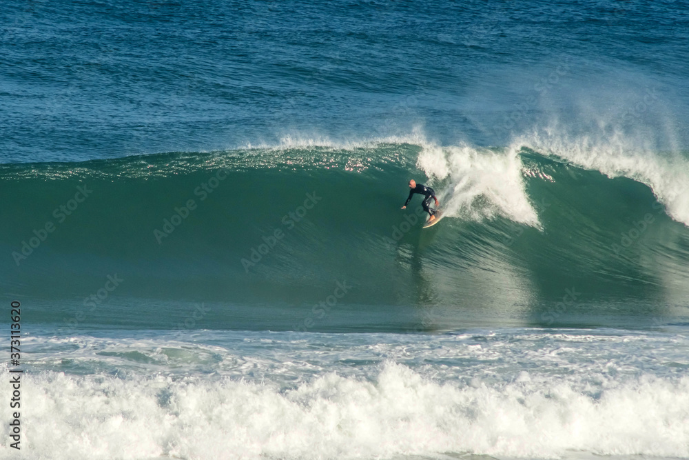 surfer in big waves