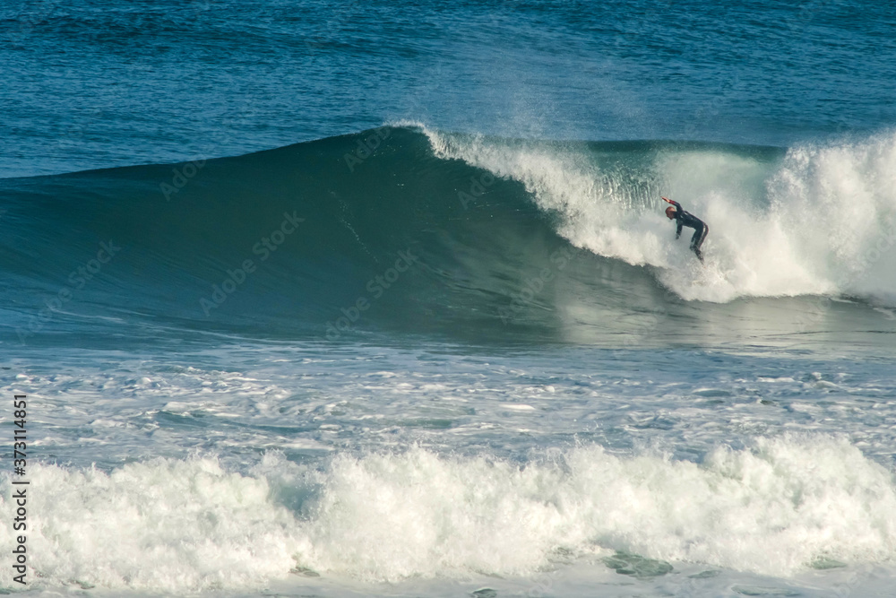 surfer in big waves