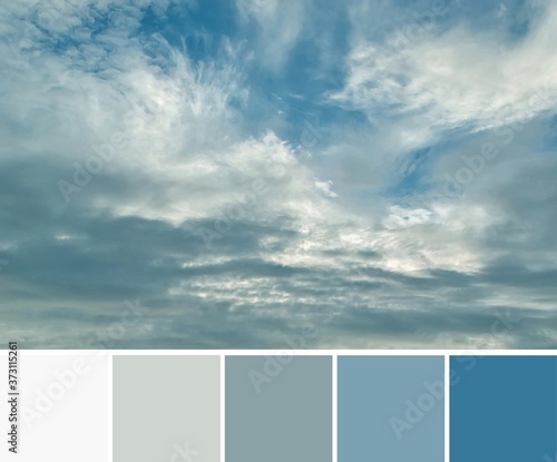 The beautiful blue gamma of the azure sky with white and grey dark clouds. Color palette swatches  natural combination of colors  inspired by nature.