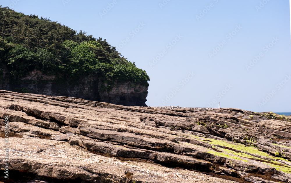 Beautiful rock and bolders on the seashore along the coastline.