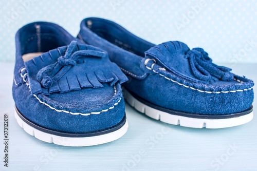 shoes are blue for a school-age girl. comfortable shoes made 