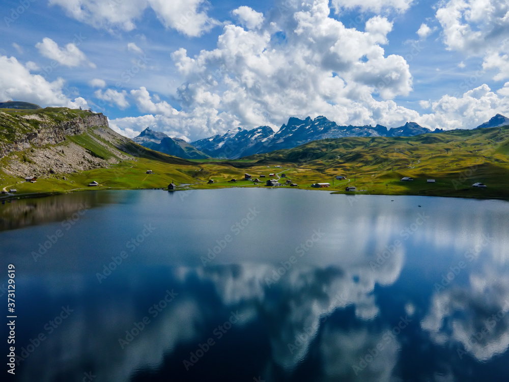 Beautiful Melchsee mountain lake in the Swiss Alps - aerial photography