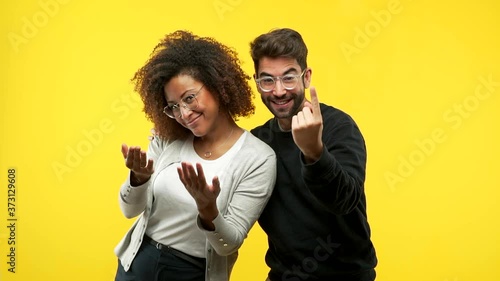 young black woman and caucasian man inviting to come
