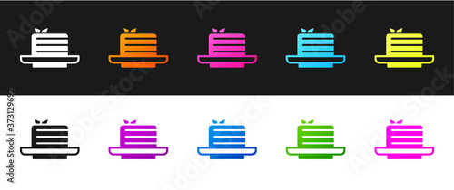 Set Medovik icon isolated on black and white background. Honey layered cake or russian cake Medovik on plate. Vector.