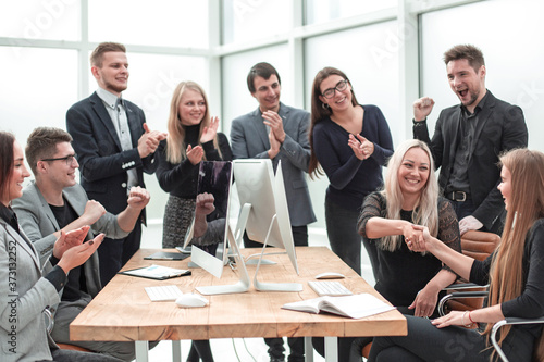 business team applauding at a work meeting