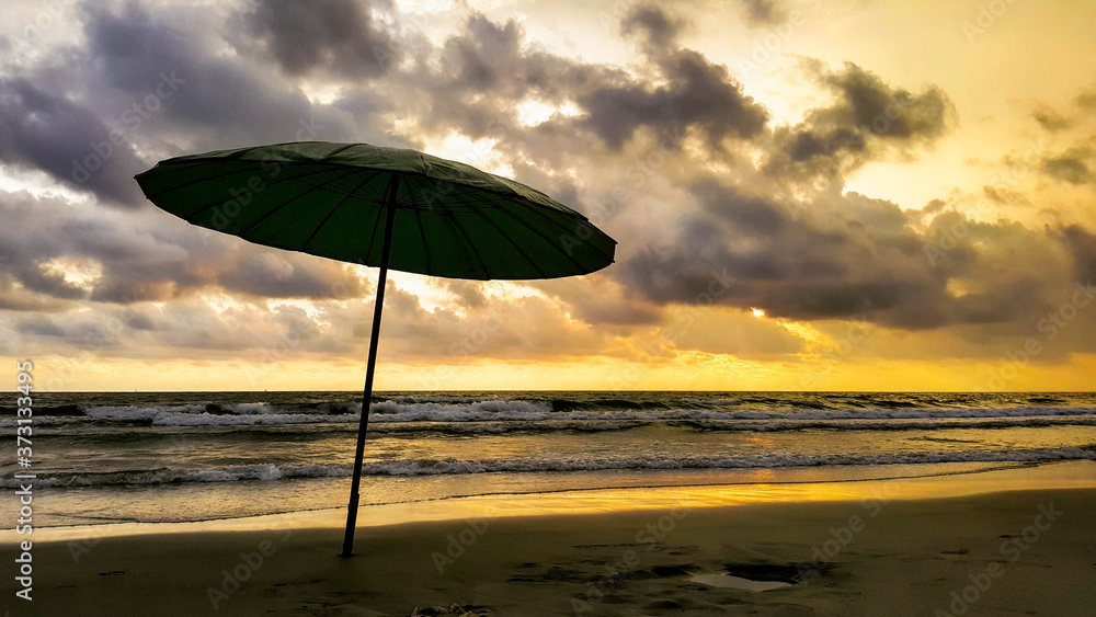 beach umbrella and sunset with vanilla sky beach umbrella and sunset with vanilla sky