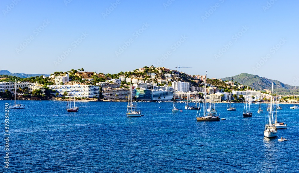 Santa Ponsa, Mallorca, Spain. View on the sea with boats, sailboats, mountains, blue sky.