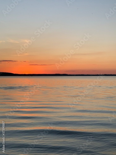 Lovely sunset over the sea. Pastel colours © Elena