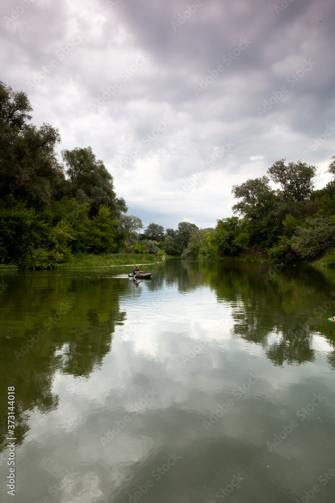 Morning on the river in the forest on a summer day Morning on the river in the forest on a summer day