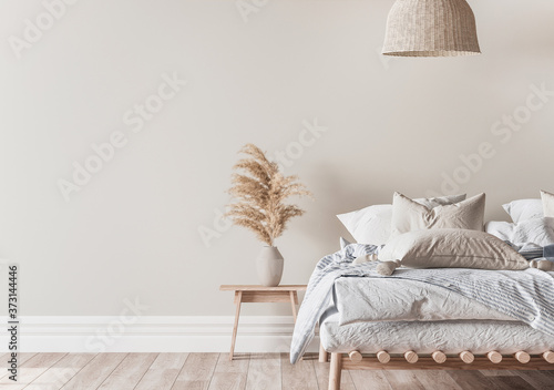 Home bedroom interior mockup with a wooden bed, beige and blue bedding, pillows, a vase of pampas and rattan lamp on empty wall background, 3d render