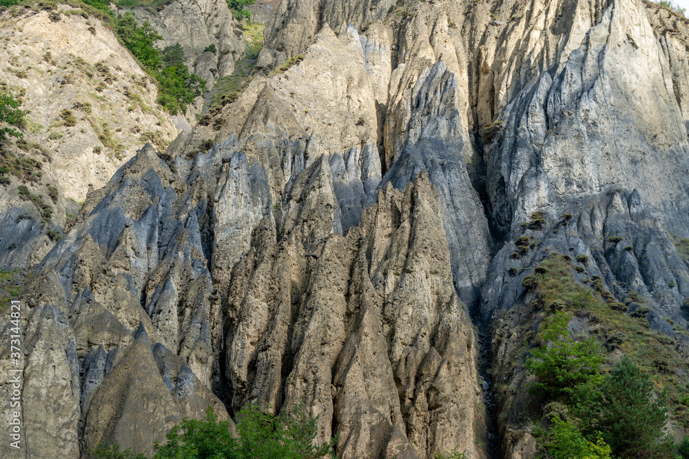 Multicolored cliffs in Khevsureti mountains, landscape, Georgia