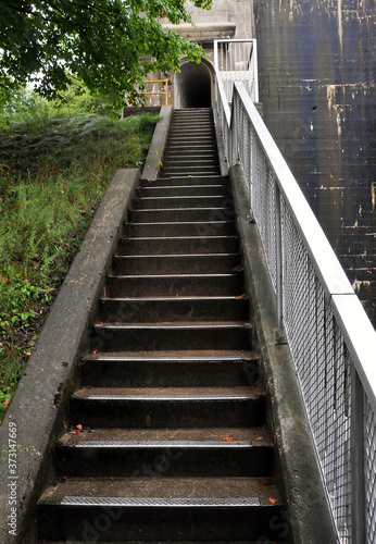 Fototapeta Naklejka Na Ścianę i Meble -  Long stairway and railing to building