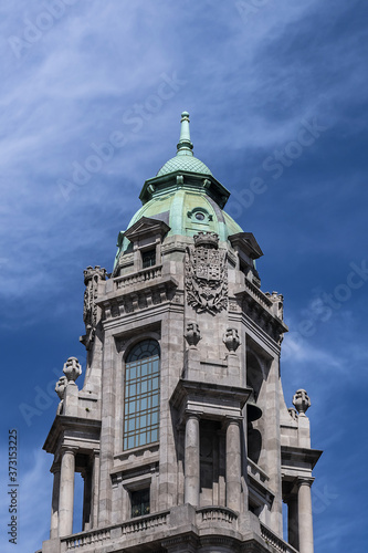 View of 70m high tower with a carillon clock at City Hall building (Camara Municipal do Porto). City Hall - a Neoclassic building at Avenida dos Aliados in Porto, Portugal. photo