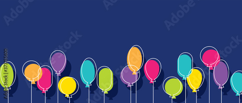 Birthday party background with colorful balloons.