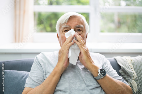 Allergic Senior Man Sneezing Nose