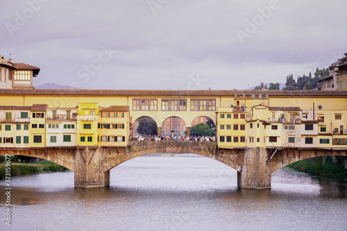 Old bridge on the river Arno in the city of florence